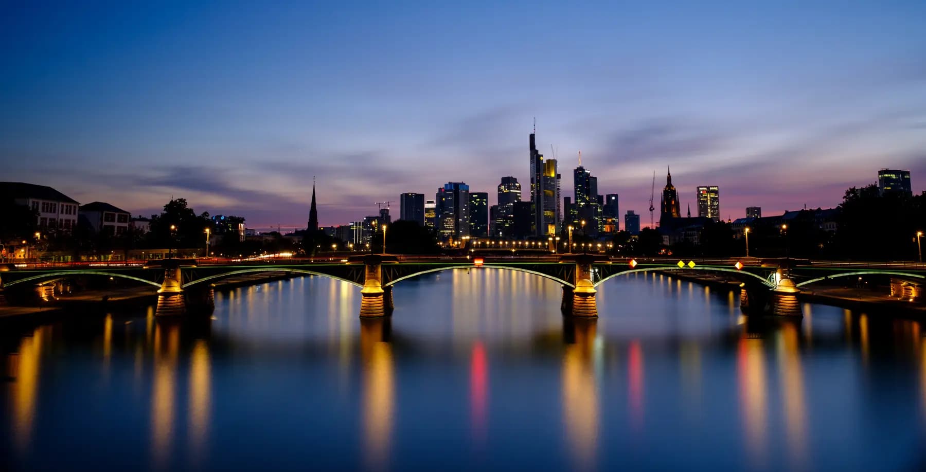 Frankfurt skyline and bridge at dusk